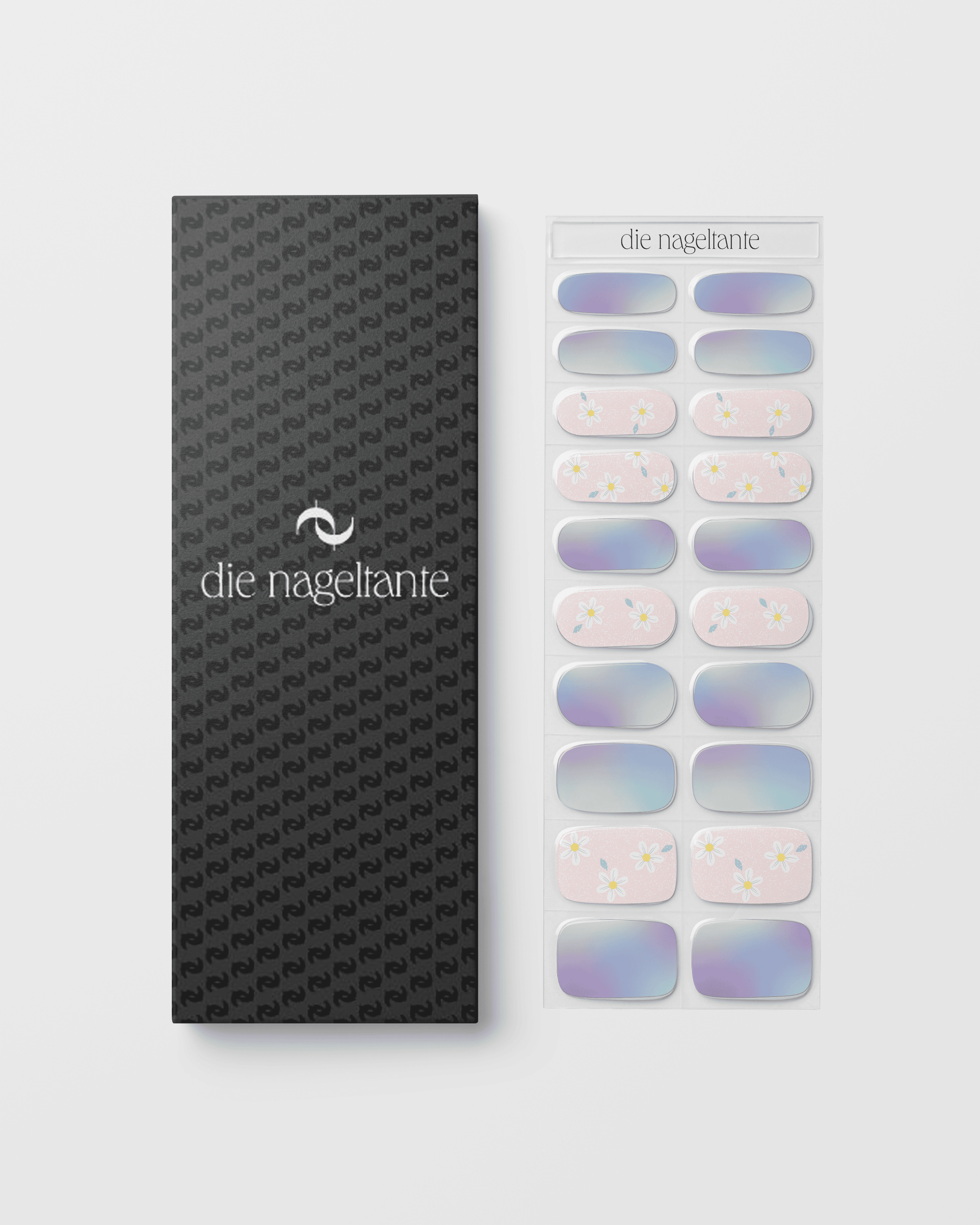 Verpackung der Abendblüte UV Gel Wraps mit Übersicht der fliederfarbenen Designs und Blütenmotive.