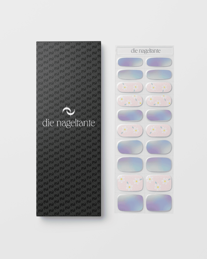 Verpackung der Abendblüte UV Gel Wraps mit Übersicht der fliederfarbenen Designs und Blütenmotive.
