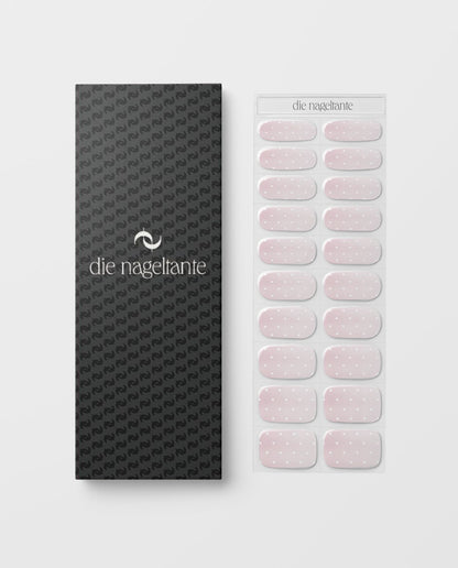 Produktbogen und Verpackung UV Gel Wraps Blush & Dots – 20 Streifen Semi-Cured im Rosé mit Punkt-Design.
