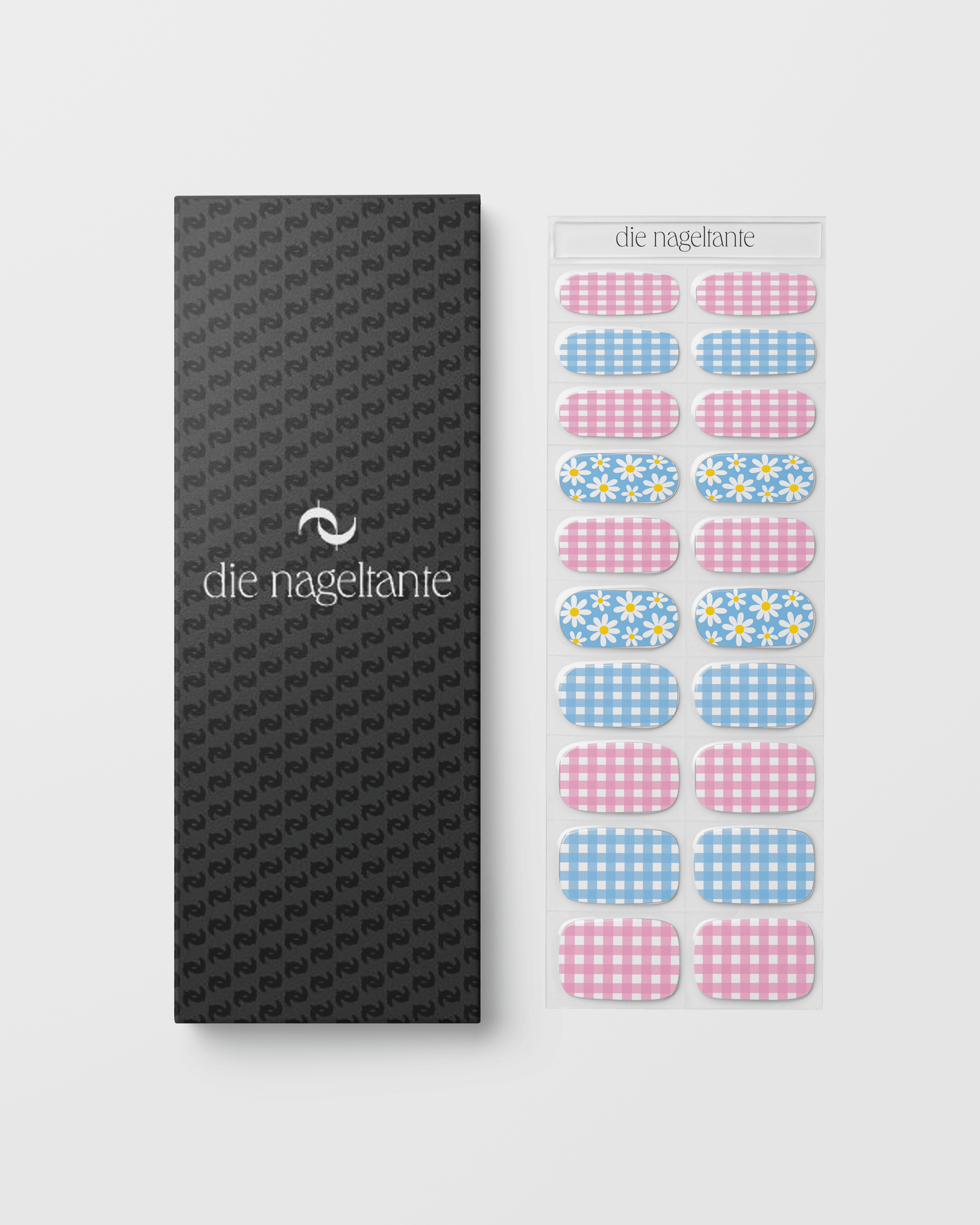 Verpackung der Tausendschön Nailpolish Wraps mit Übersicht der enthaltenen Pastell-, Blumen- und Vichy-Karo-Designs.